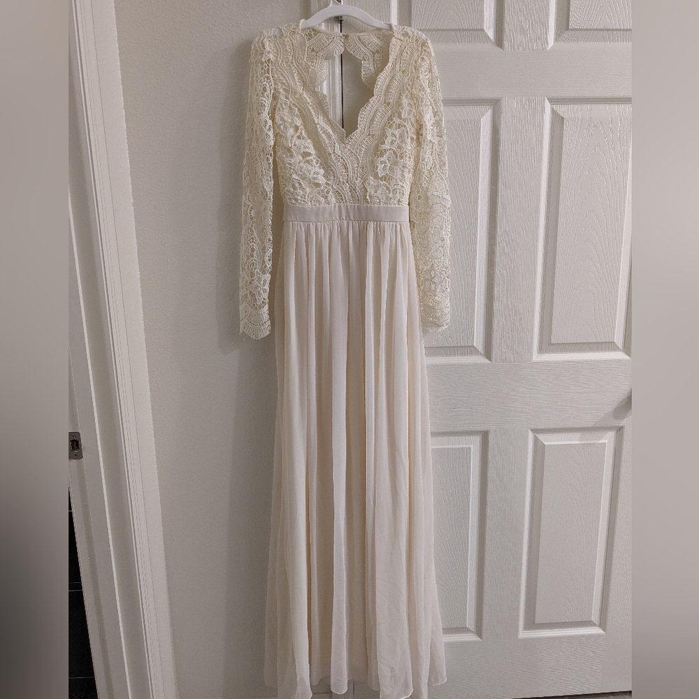 NWOT. Open back white crochet boho dress